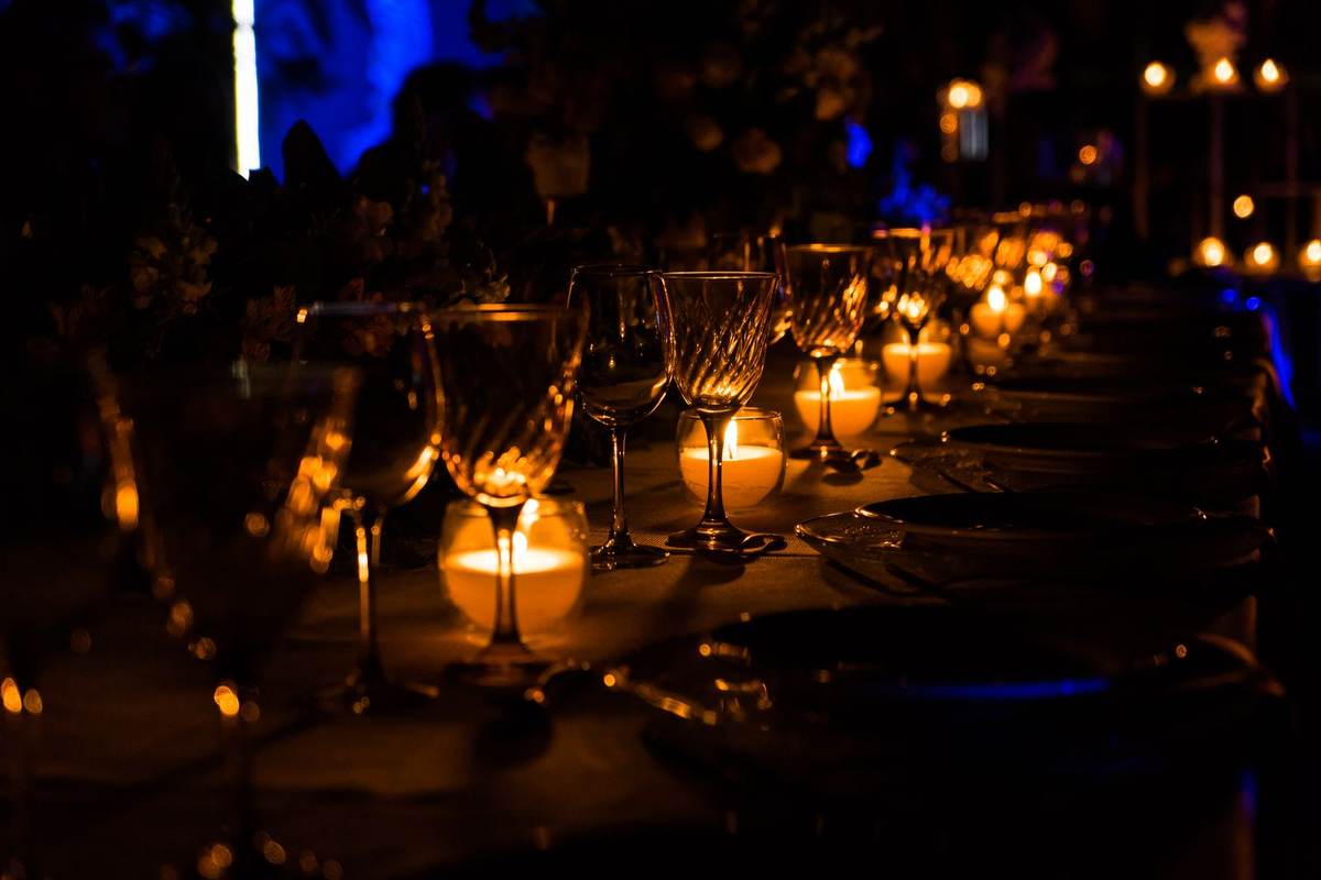 Private dinner table set at dusk on a villa terrace in Mauritius