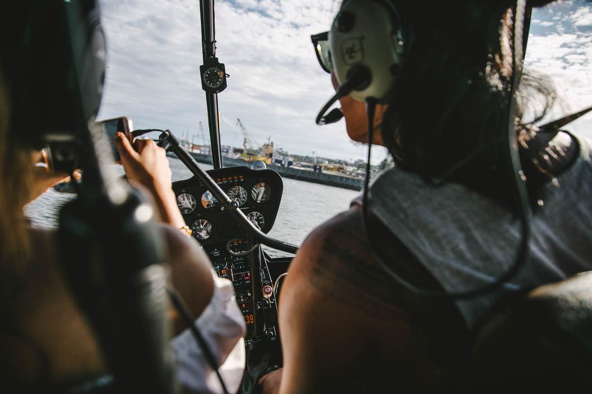Private helicopter crossing the Mauritius lagoon shortly after leaving SSR airport